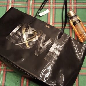 𝅺victoria's secret holographic bag.